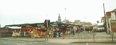 [view of stalls in street]