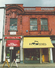 [redbrick fronted building with plaque]