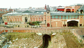 [river running under market hall]