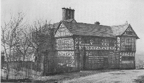 [BW picture of two storey building]