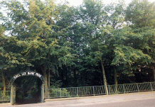 [trees and park entrance]