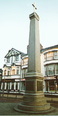 [Cross on plinth]