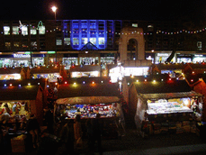 [lights and market stalls from toen hall steps]